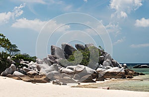 Natural rock formation on white sand beach at the coast in Belitung Island.