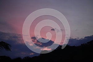 Natural colored aurora reflection on evening sky