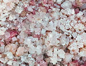 Natural salt with pink crystals close-up