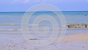 Natural Scenery Of A Calm Ocean With Small Waves On The Beach