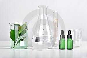 Natural skincare beauty product research, Organic botany extraction in scientific glassware at science laboratory