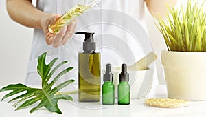 Natural skincare cosmetics research and development concept, Doctor formulating new beauty products from organic natural plants.