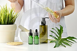 Natural skincare cosmetics research and development concept, Doctor formulating new beauty products from organic natural plants.