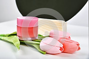 Natural skincare pink bottle, Cosmetic containers packaging with tulip flower essence extract