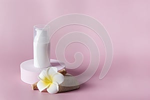 Natural skincare product branding mock up Blank white squeeze bottle plastic tube on circle podium with flower Packaging of cream