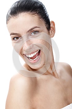 Natural smiling woman with sunspots
