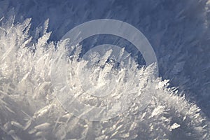 Natural snow crystals. Very frosty weather in the mountains. Macro photography