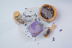 natural soap bar and dry lavender flower on table
