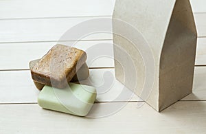 Natural soap bars in a paper bag