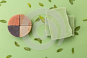 Natural soap on green background. with eucalyptus leaves. Undertone. Close-up photo