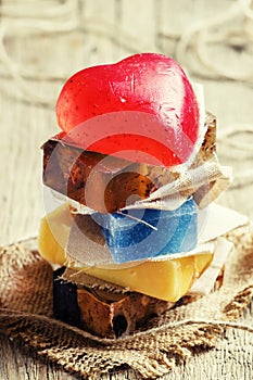 Natural soap on a vintage wooden background, selective focus