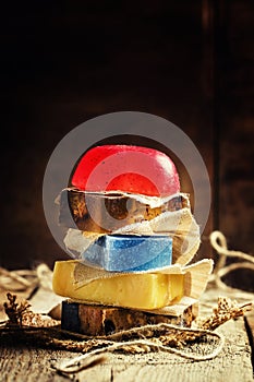 Natural soap on a vintage wooden background, selective focus