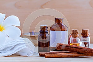 Natural Spa ingredients and bottle of herbal extract oil for alternative medicine and aromatherapy. Thai Spa theme with ayurvedic