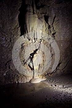 Natural speleothem stalactites and stalagmites in Nizhneshakuranskaya cave