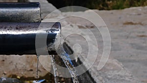 Natural spring water and fountain, tap water flowing through the pipe, fountain