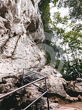 Natural stairs at the rainforest rock mountain cave in Malaysia