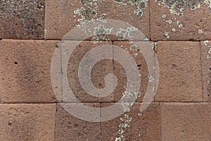 Natural stone abstract background wall made by ancient Inca of Peru in South America. Background with copy space