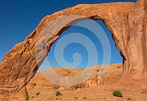 A natural stone arch in the desert