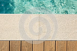 A natural stone. Facing tiles. Paving slabs. Granite. Marble. Crushed stone Texture. Terrace. The territory near the pool.