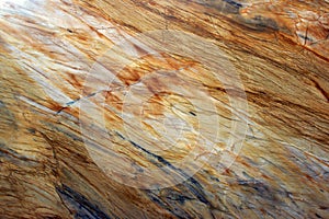 Natural stone, marble texture in yellow with gray streaks and stripes, beautiful background