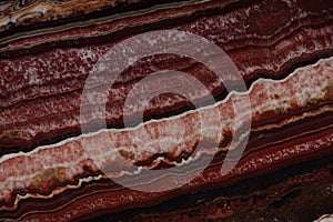 Natural stone is red marble with an interesting pattern Onice Fantastico photo