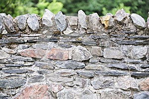 Natural stone and slate traditional wall in the Lake District England UK