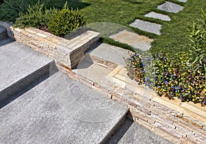 Natural stone stairs in a beautiful home garden