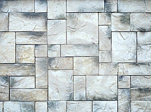 Natural stone tiles are beautifully laid out and create a strict geometric pattern