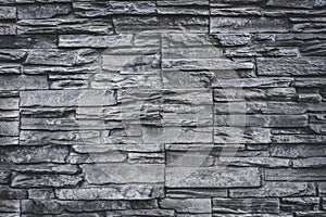 Natural stone wall background - grey granite stone texture