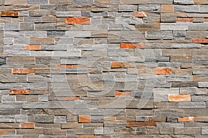 Natural stone wall cladding background photo
