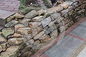 Natural stone wall dry laid