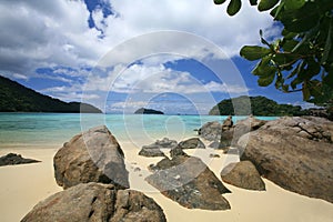 Natural stones at beautiful tropical coastline