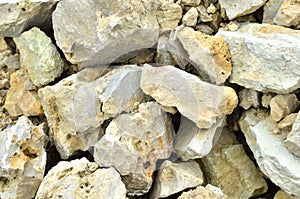 Natural stones dolomite close up in the limestone open-pit mining. Building materials, wall background, texture