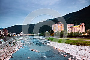 Natural stream of Gero onsen resort town at sunset time in Gifu, Japan