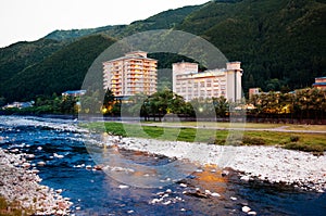 Natural stream of Gero onsen resort town at sunset time in Gifu, Japan