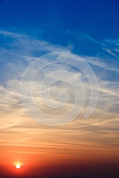 Natural Sunset Sunrise Over Field. Bright Dramatic Sky And Dark Ground. Landscape Under Scenic Colorful Sky Warm Colours