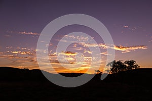Natural Sunset Sunrise Over karijini national park. Bright Dramatic Sky And Dark Ground. Kaijiri National Park, Western Australia