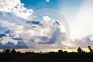 Natural sunsets over Bright Dramatic Sky and dark ground.