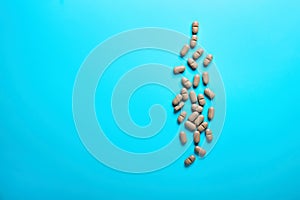 Natural Supplements scattered on a light background