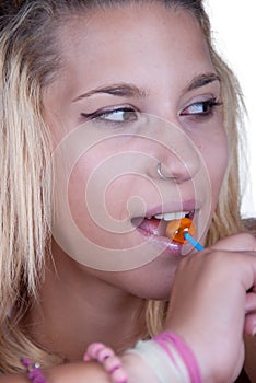 Natural teen with a lollipop