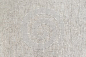 Natural tissue texture as background. Linen or cotton white-gray fabric. Place for your text