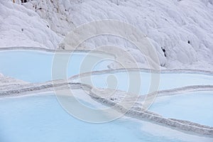 Natural travertine pools and terraces in Pamukkale. Cotton castle in southwestern Turkey. Pamukkale travertine and ancient city of