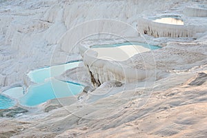 Natural travertine pools and terraces with water in Pamukkale