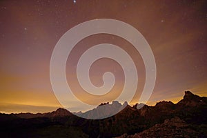 Natural view of Milky Way Galaxy over the Dolomites Mountains. On exposure shot.