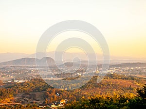 Natural viewpoint, mountains, hills, forests and river under morning mist