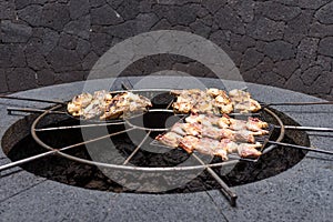 Natural volcanic stove grills meat for the restaurant at Timanfaya national park, Lanzarote, Canary Islands