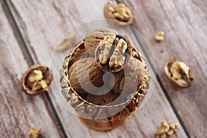 Natural walnut fruit in a hard brown shell