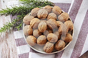 Natural walnut in a hard brown shell