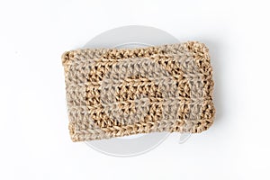 Natural washcloth made of craft thread for washing dishes. The concept of waste-free production , zero waste on white