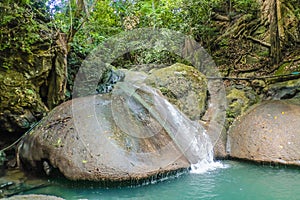 Natural water fall slider in erawan waterfall natiaonal park kanchanaburi
